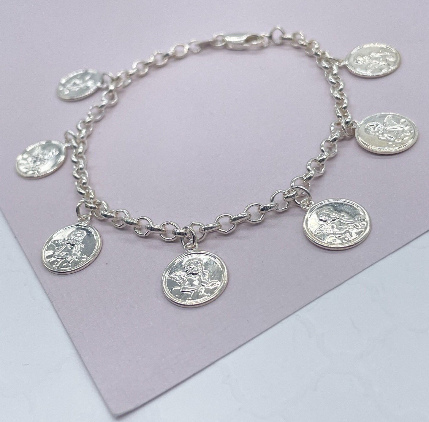 Silver Filled Angel Charm Rolo Bracelet Featuring Seven Angel Medals