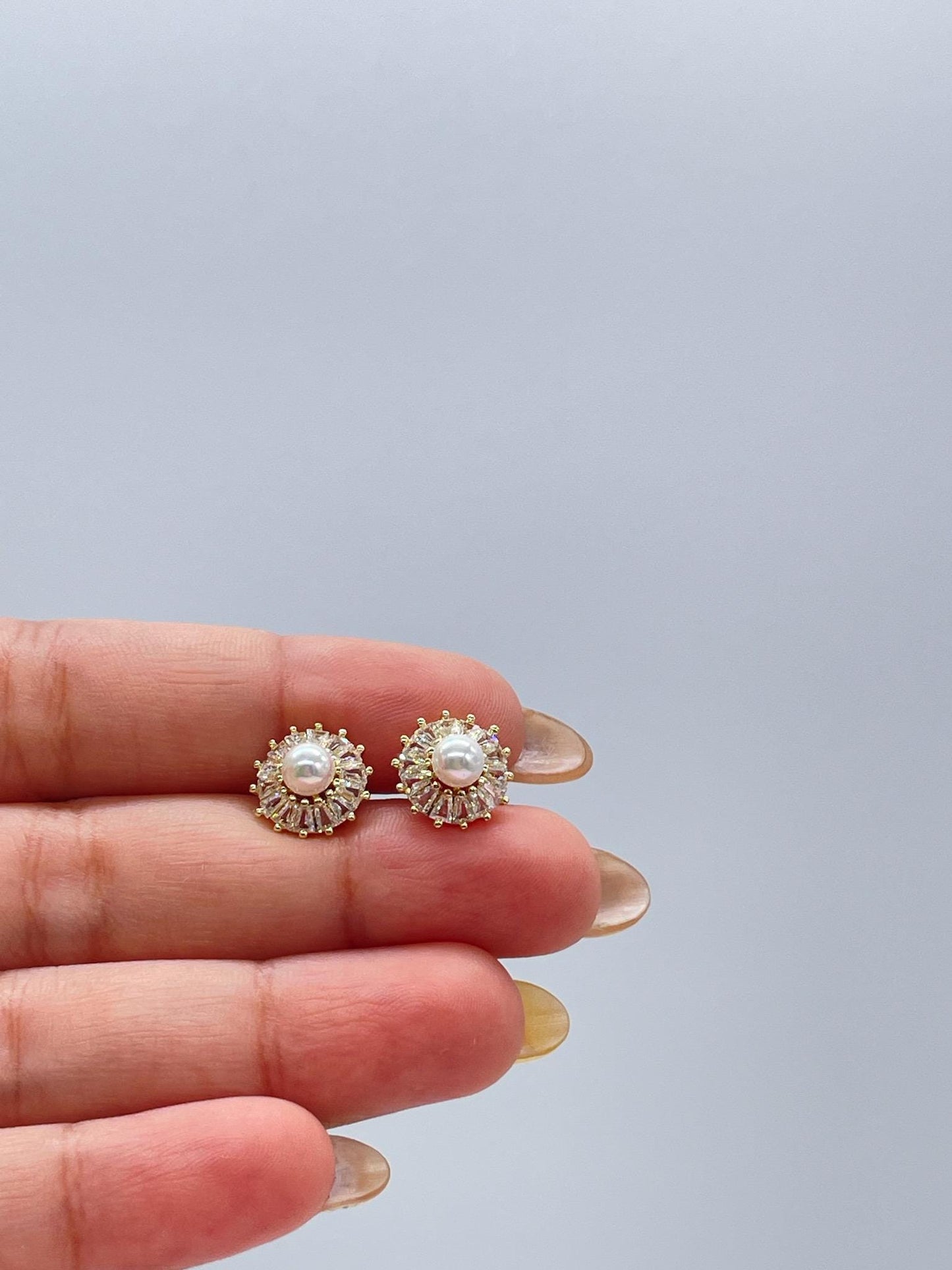 18k Gold Filled Round Stud with mini baguette zirconias and a baby pearl in the middle