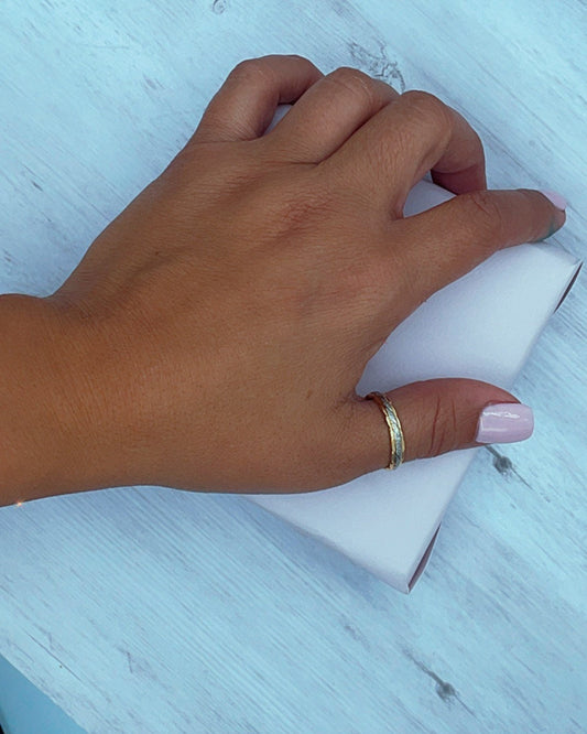 18k Gold Layered Twisted Details Ring Featuring A Line of Silver On Top Of The