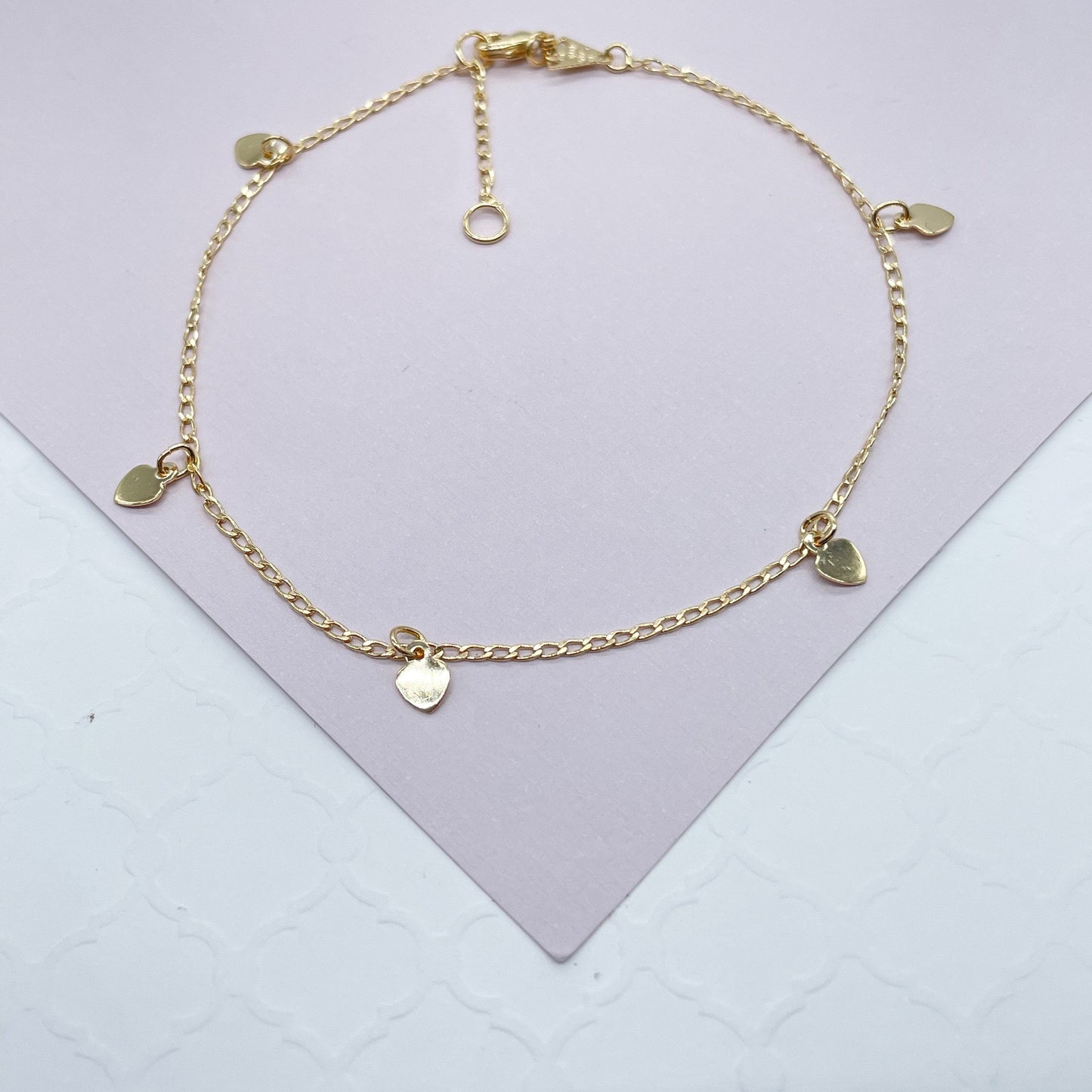 CO - 18k Gold Layered Charm Anklet Featuring Options In Heart or Leaves Wholesale
