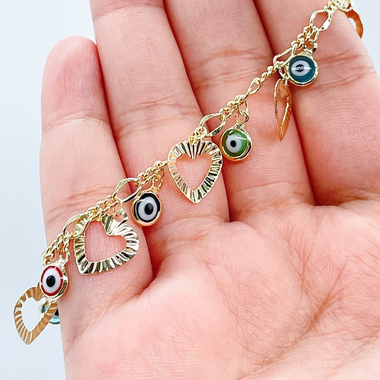 18k Gold Filled Charm Bracelet Featuring Seven Hearts and Seven Colorful Evil Eyes