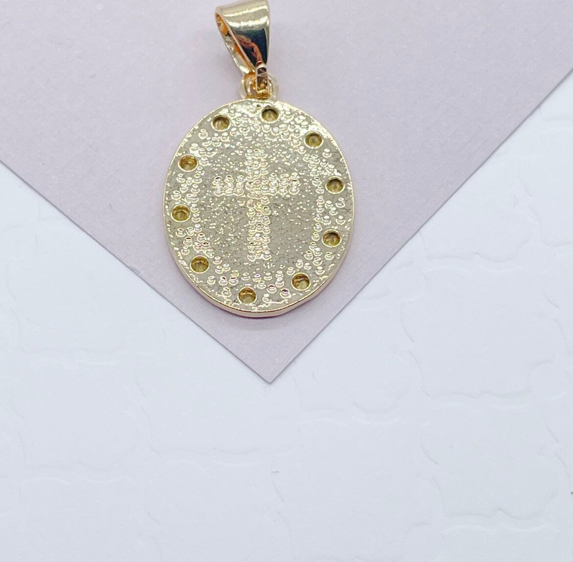 Double sided 18k Gold Filled Jesus Charm And Cross In The Back Featuring Cubic Zirconia Around Pendant