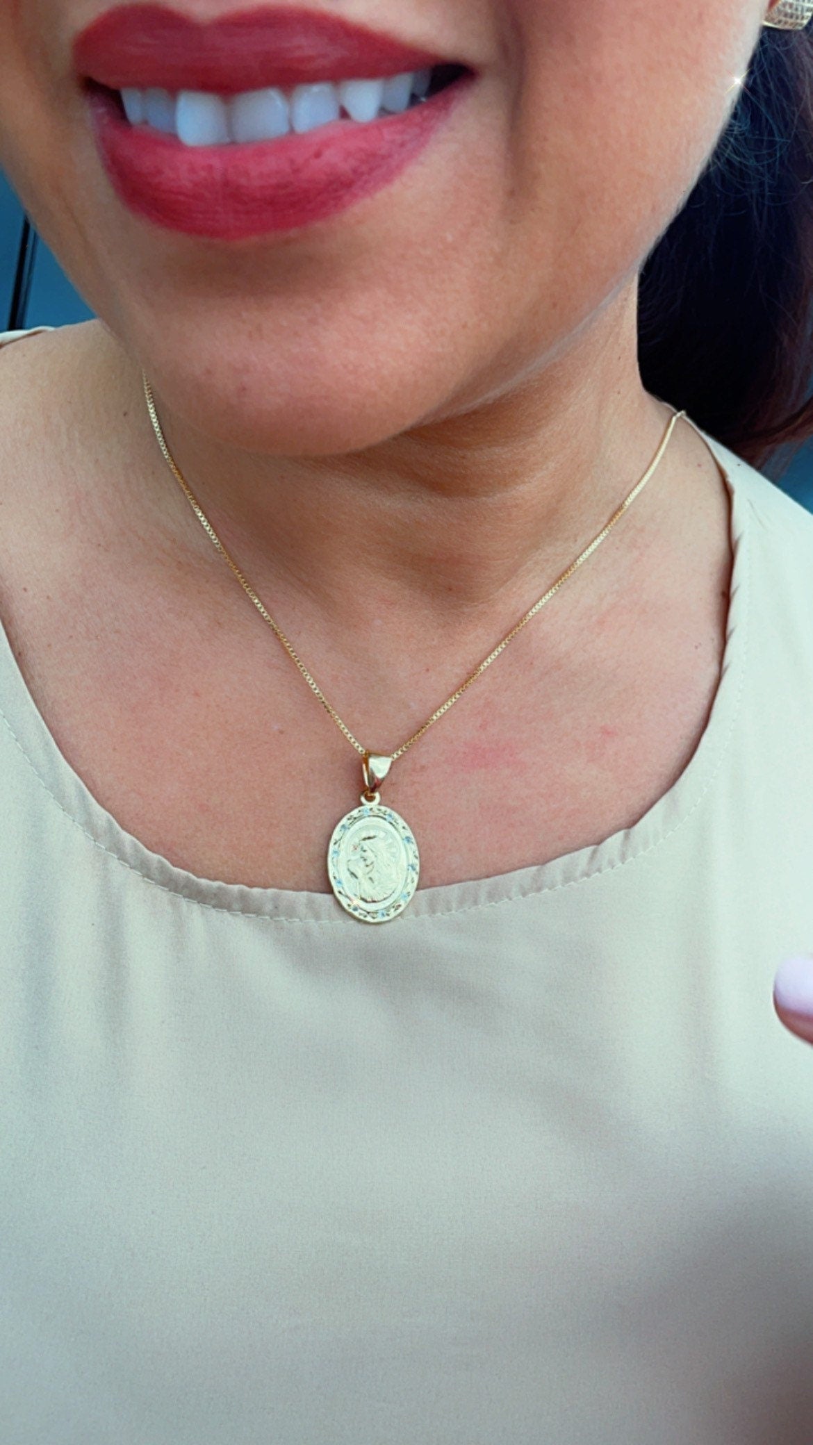 Double sided 18k Gold Filled Jesus Charm And Cross In The Back Featuring Cubic Zirconia Around Pendant