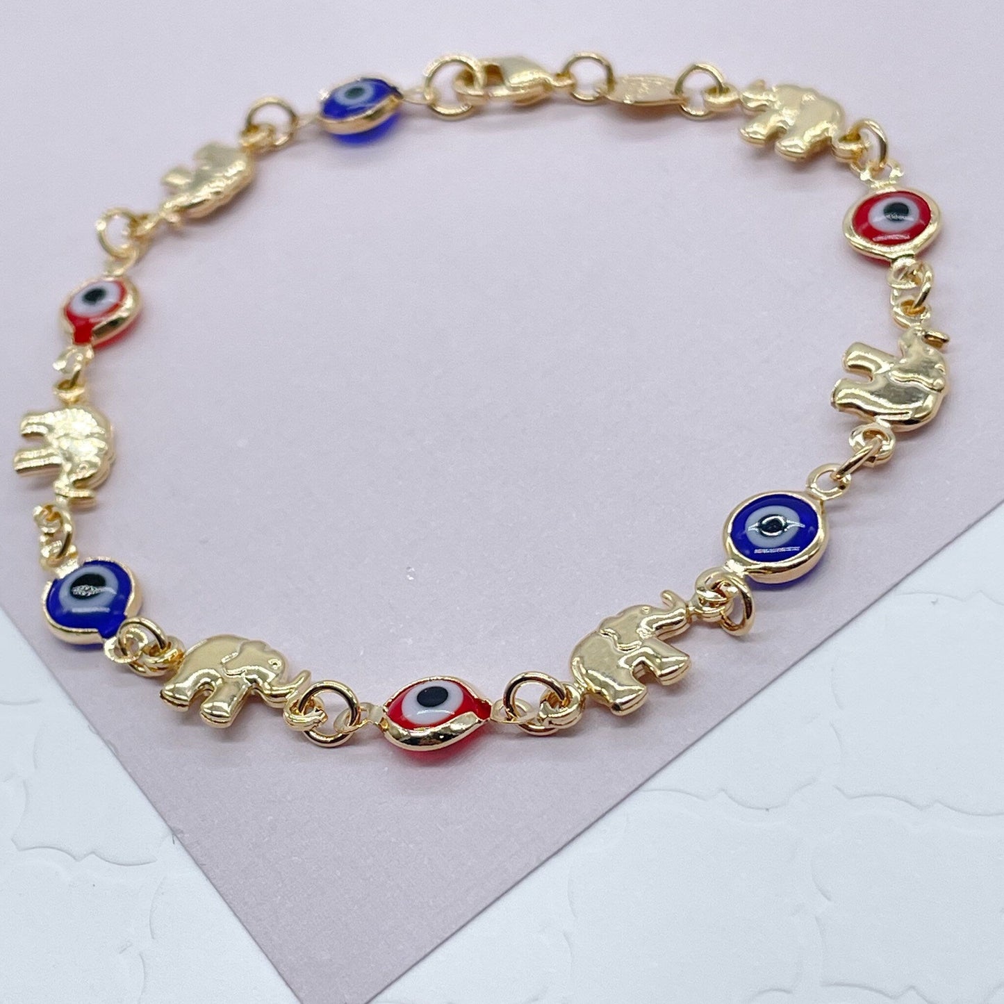 18k Gold Filled Elephant and Evil Eye Bracelet Featuring Red And Blue Evil