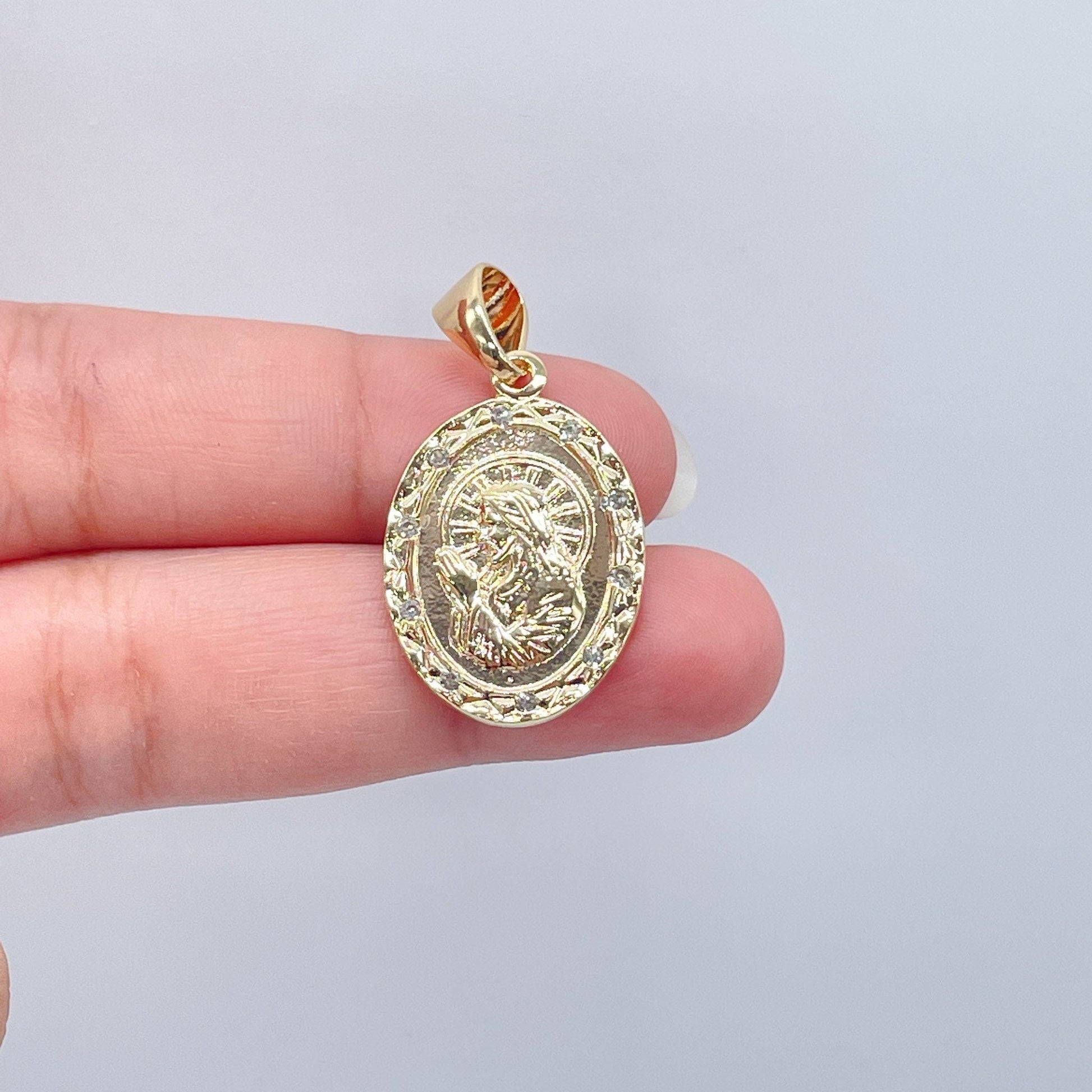 Double sided 18k Gold Filled Jesus Charm And Cross In The Back Featuring Cubic Zirconia Around Pendant