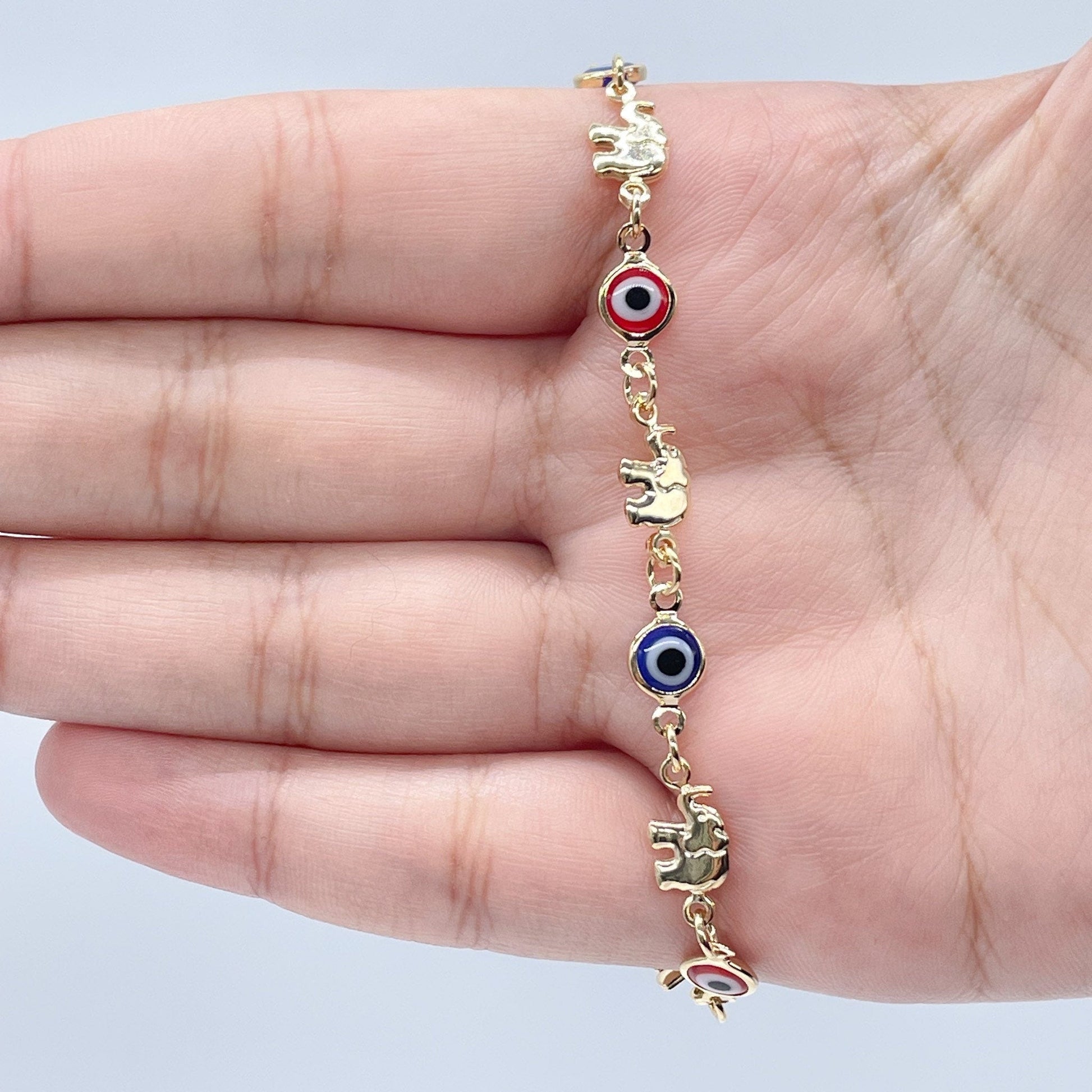 18k Gold Filled Elephant and Evil Eye Bracelet Featuring Red And Blue Evil