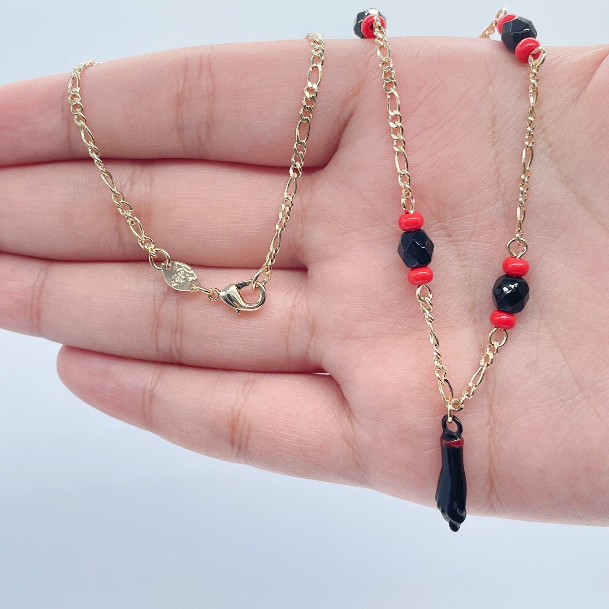 18k Gold Filled Figaro Necklace Featuring Black "Figa", Red Beads, Simulated