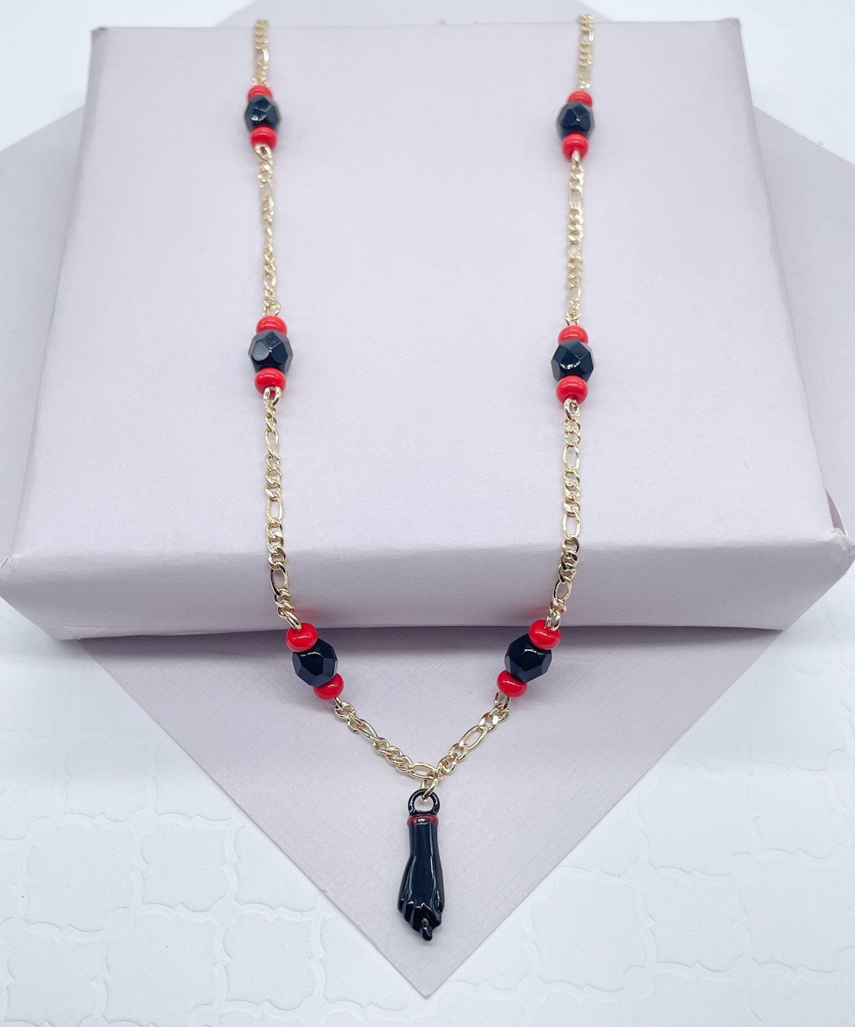 18k Gold Filled Figaro Necklace Featuring Black "Figa", Red Beads, Simulated