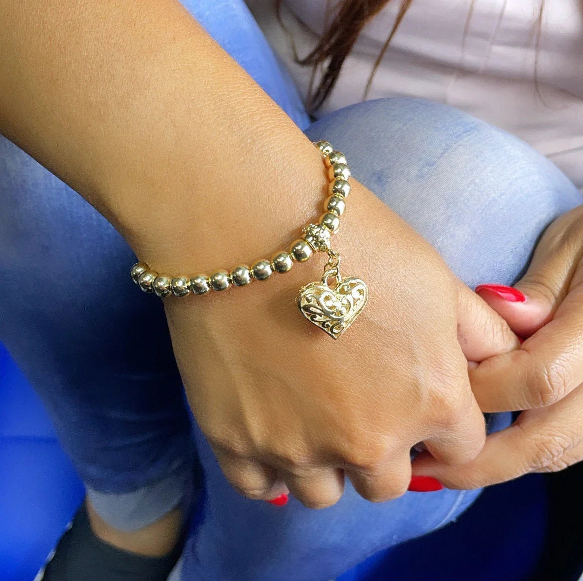 18k Gold Layered Beaded Bracelet With Patterned See Through Heart Featuring Fancy