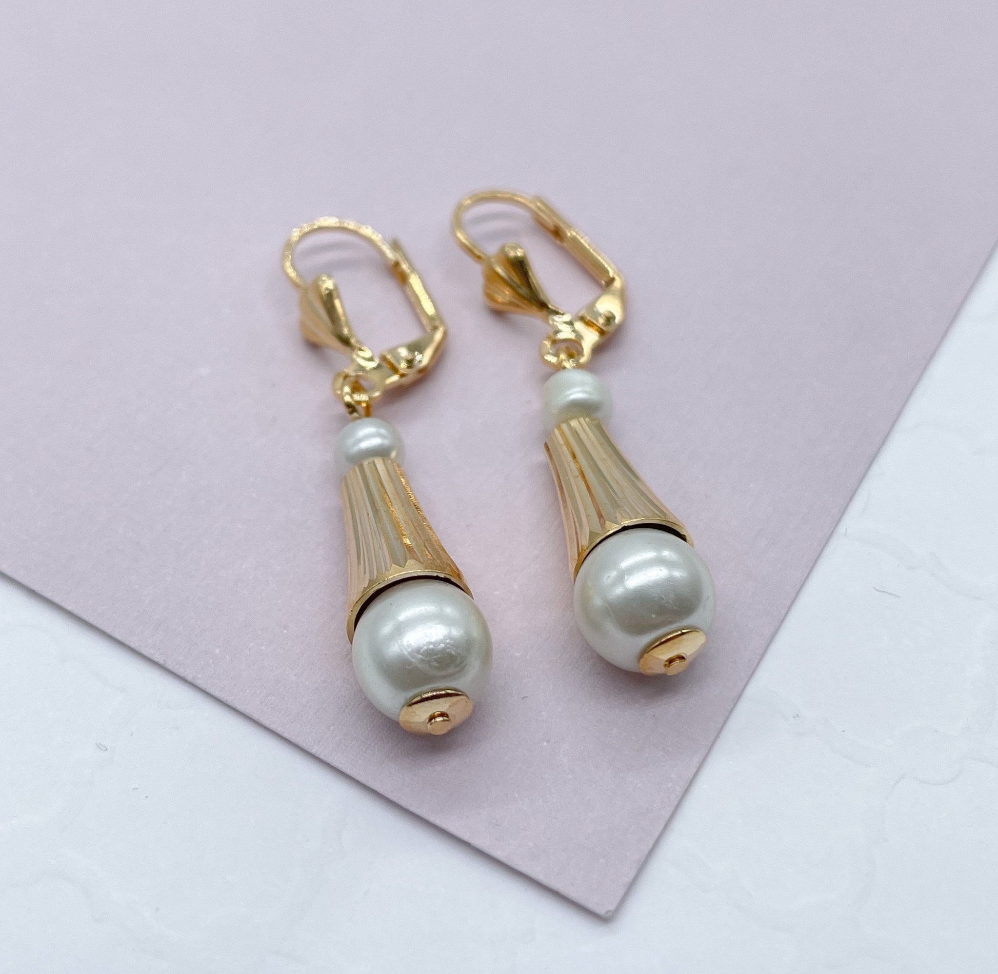18k Gold Filled Dangling Earring With Simulated Pearl Ball Attached To The