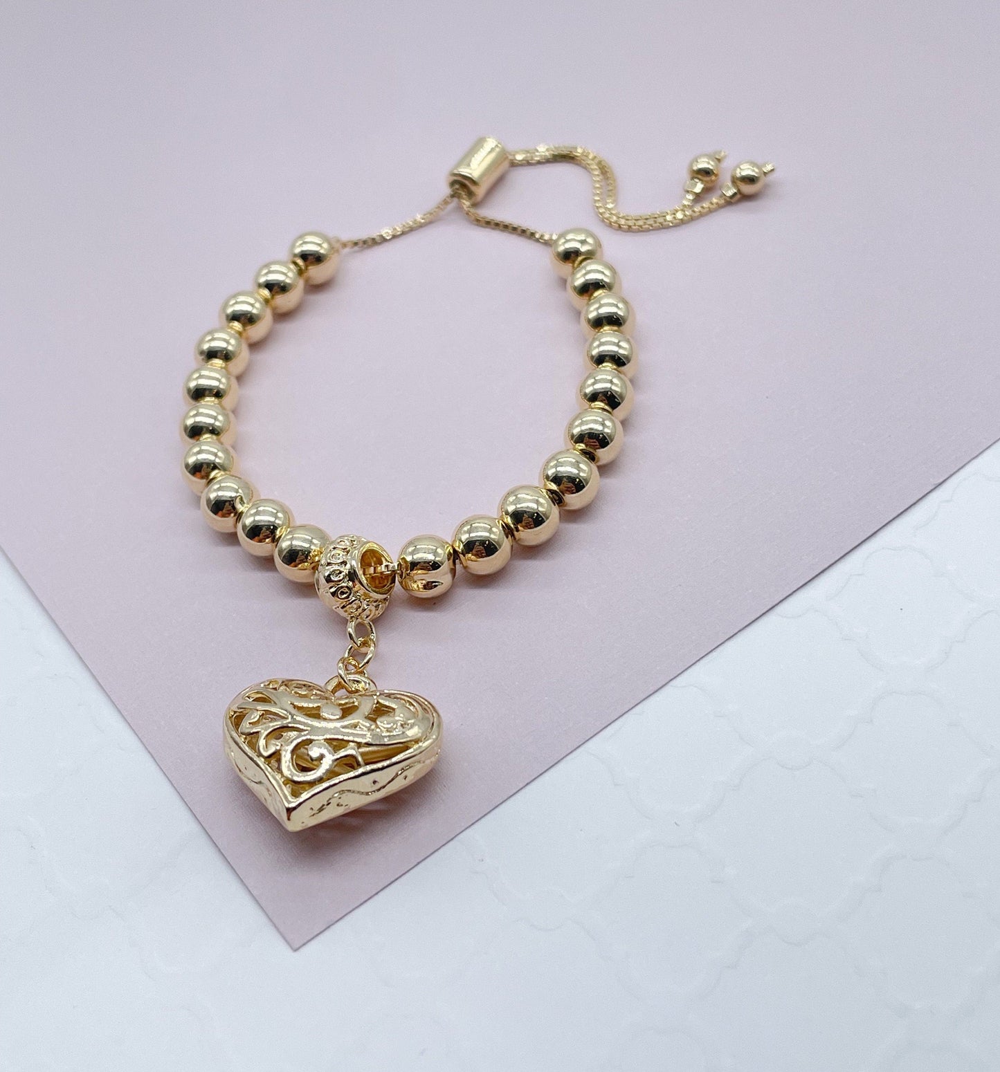 18k Gold Filled Beaded Bracelet With Patterned See Through Heart Featuring Fancy Bail And Slide Clasp