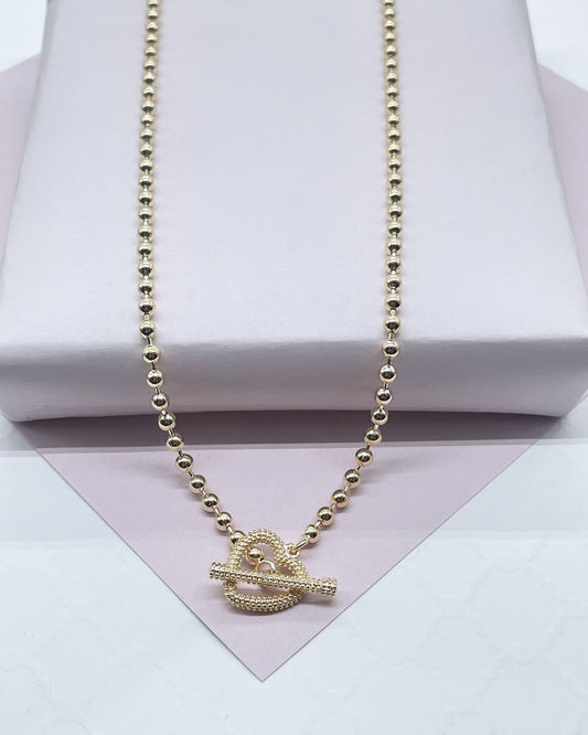 18k Gold Layered 3mm Beaded Necklace Featuring Toggle Heart Clasp