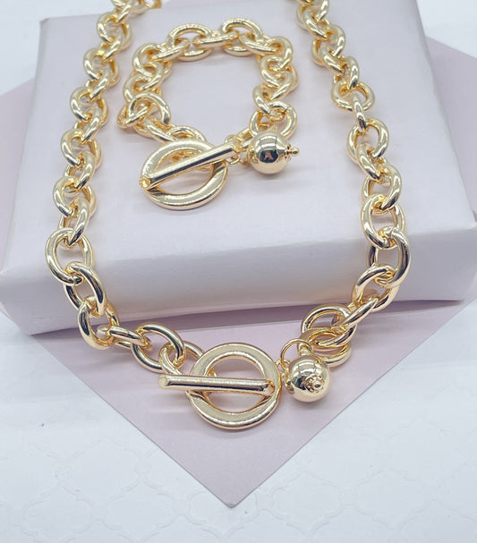 18k Gold Filled Oval Link Necklace And Bracelet Set Featuring Toggle Closure And Hanging Ball