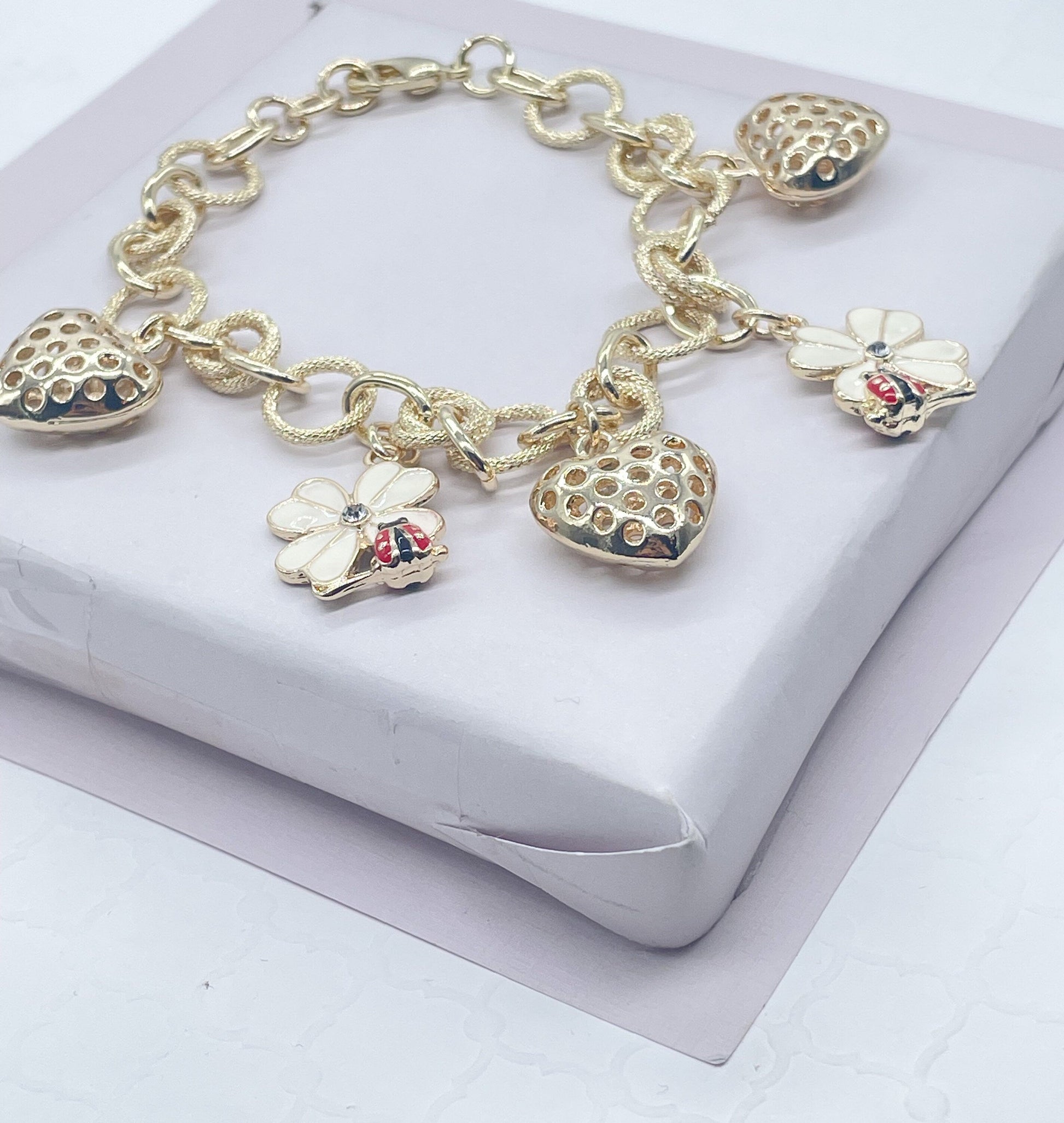 18k Gold Filled Textured Link Charm Bracelet With Puffy Heart, Lady Bug & Flower Charms Wholesale Jewelry