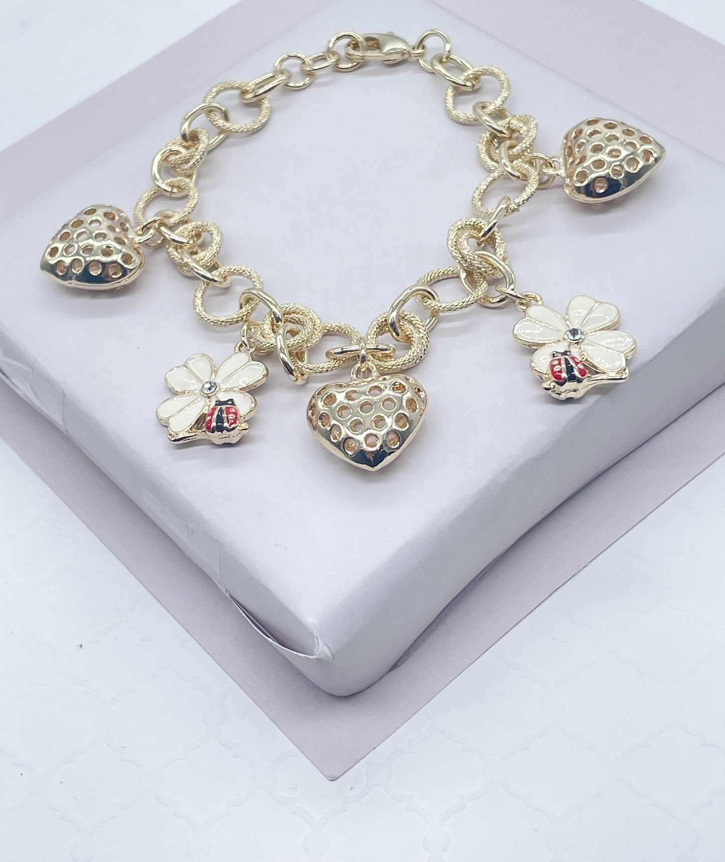 18k Gold Filled Textured Link Charm Bracelet With Puffy Heart, Lady Bug & Flower Charms Wholesale Jewelry