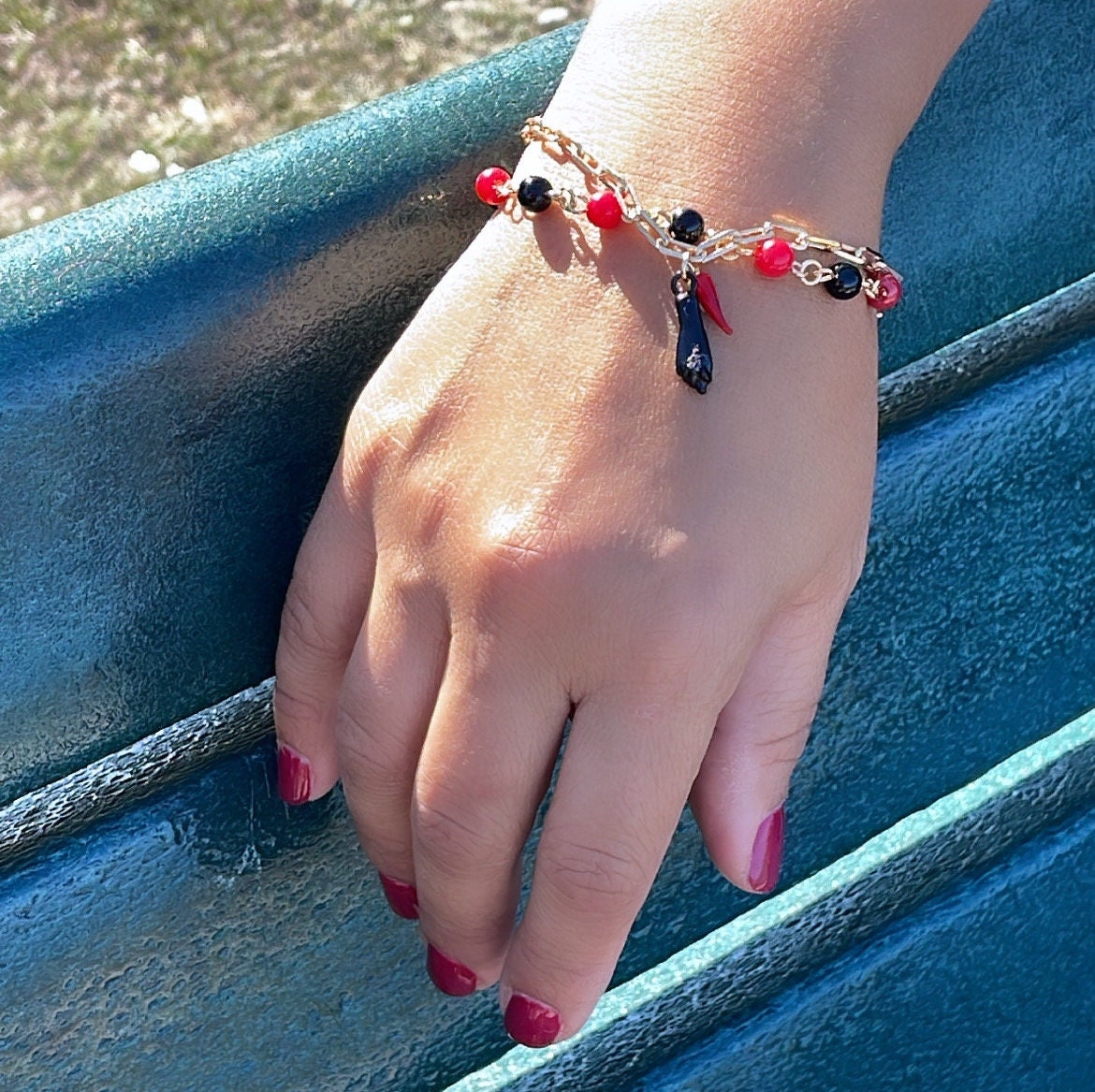 18k Gold Filled Bracelet with black and red beads and Pepper & Figa Charms