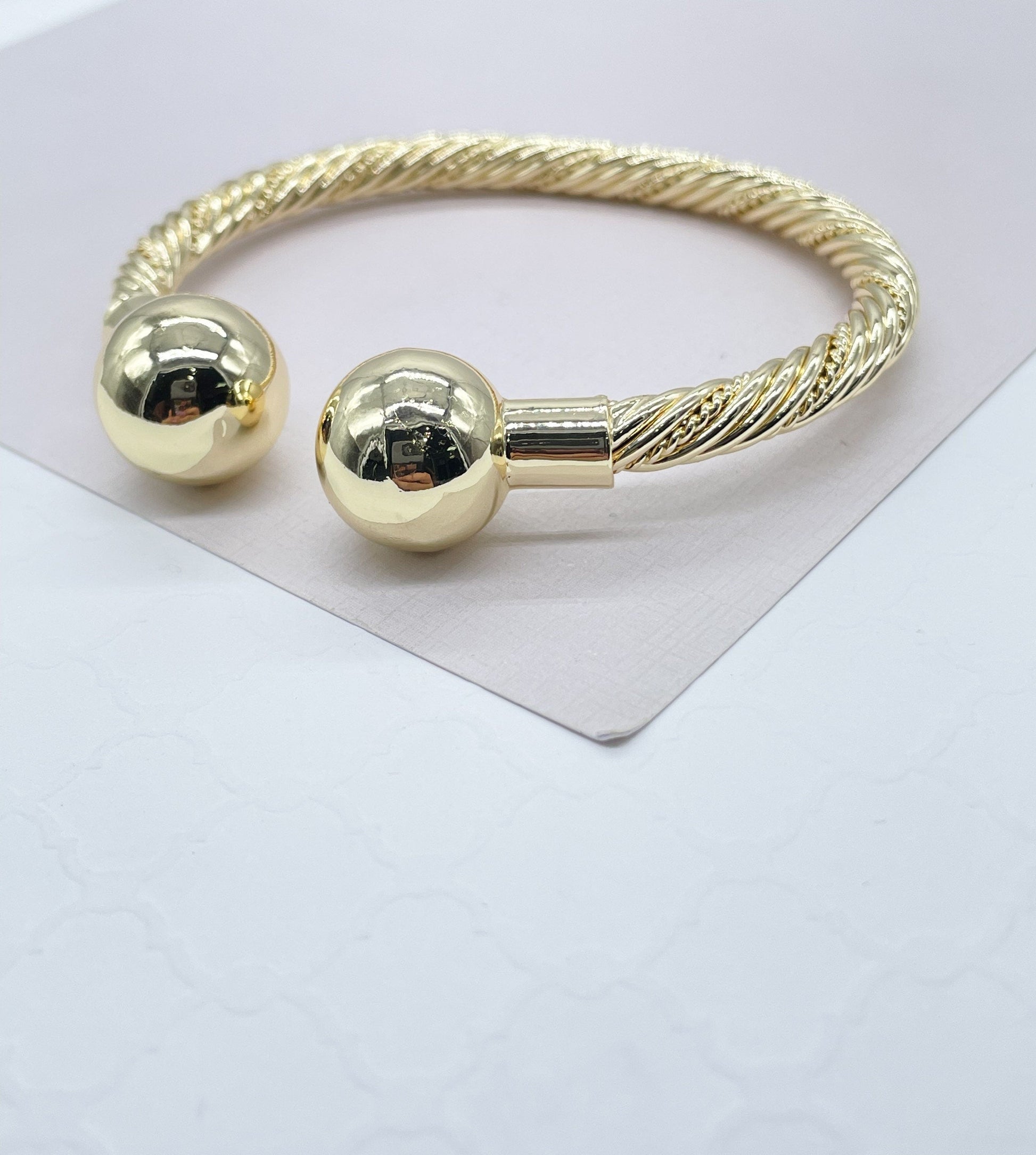 18k Gold Filled Twisted Bangle Featuring Two Solid Balls On Top Wholesale