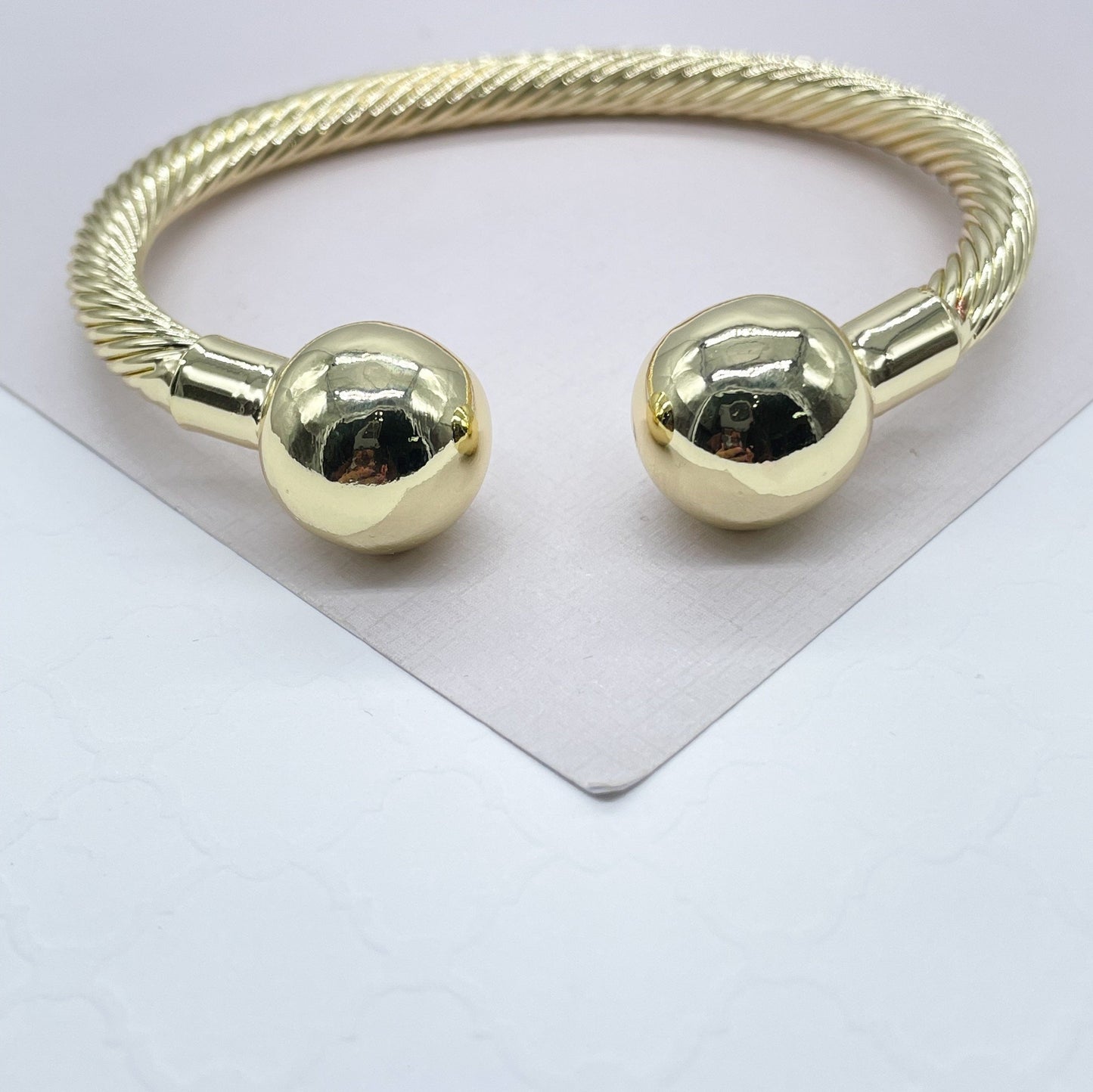 18k Gold Filled Twisted Bangle Featuring Two Solid Balls On Top Wholesale