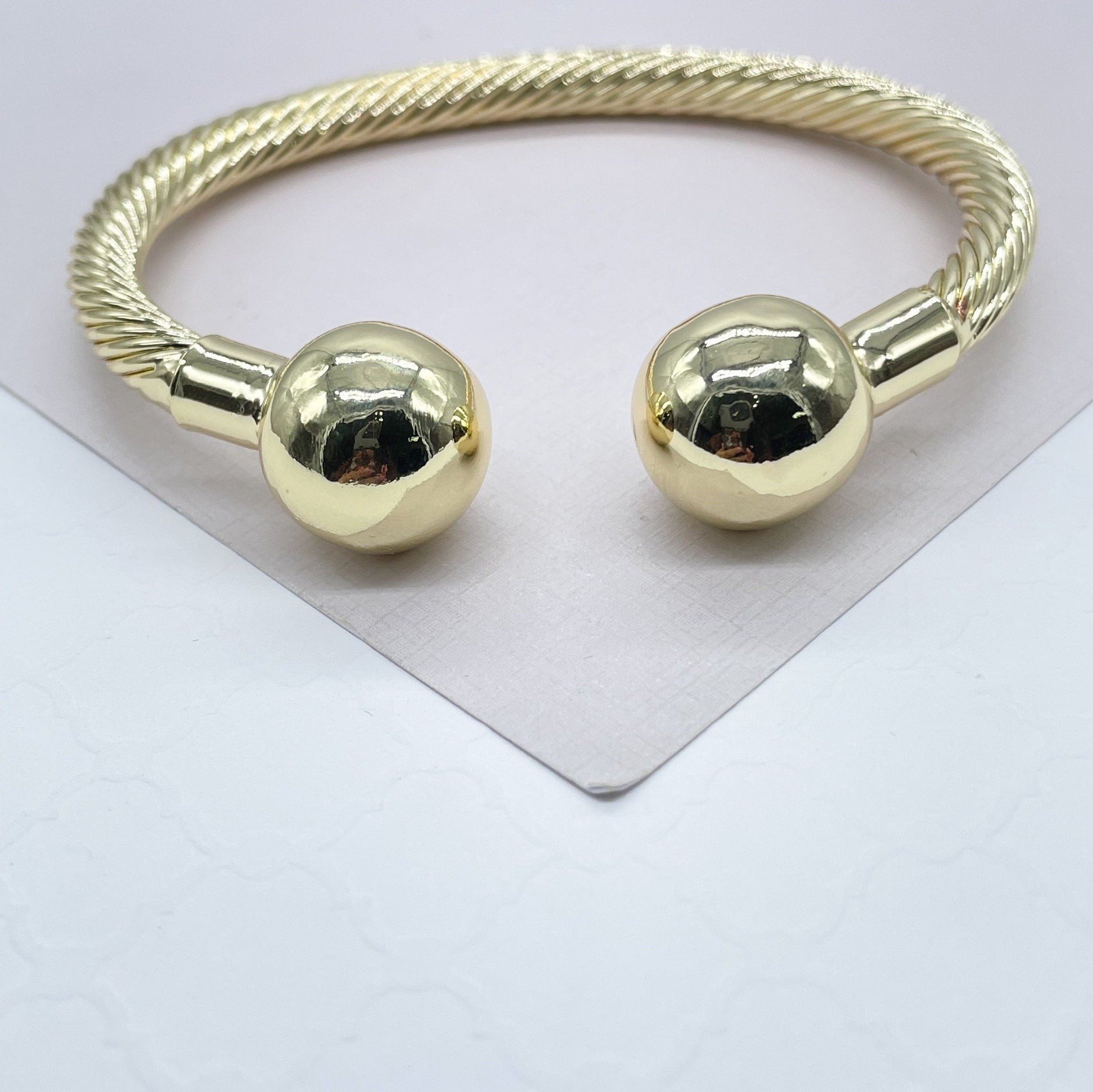 18k Gold Filled Twisted Bangle Featuring Two Solid Balls On Top Wholesale