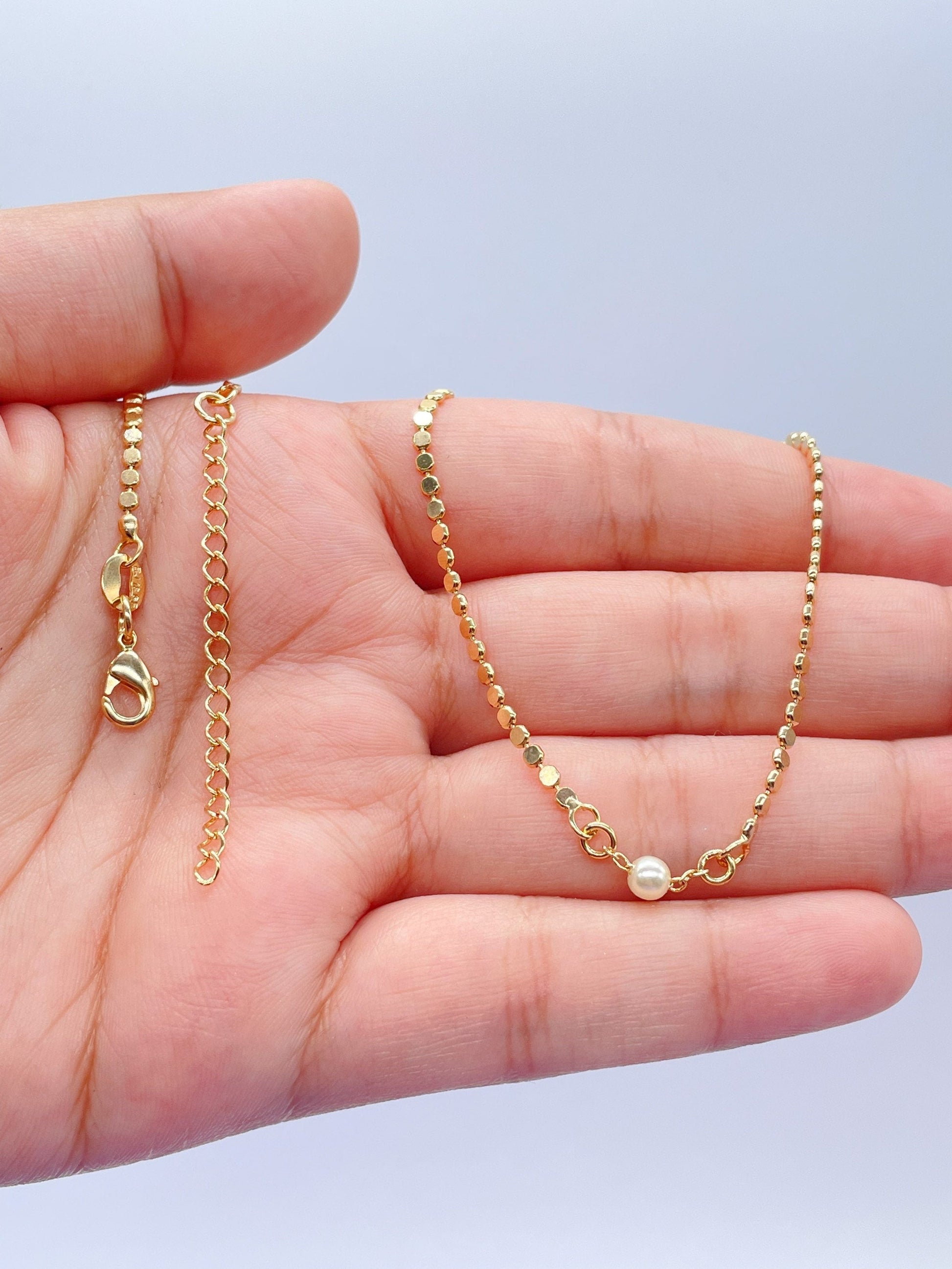 18k Gold Filled Flat Beaded Necklace With Pearl Ball In Center