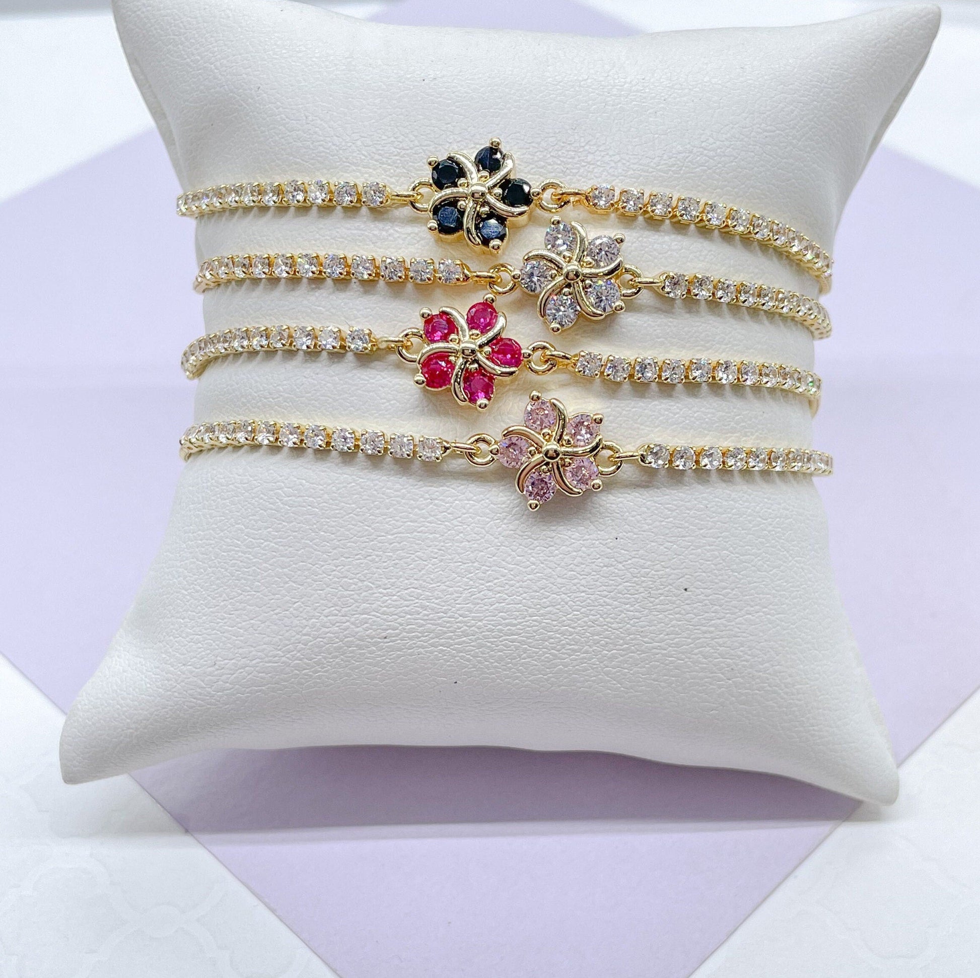 18k Gold Filled Adjustable Tennis Bracelet With CZ Flower Charm In Center