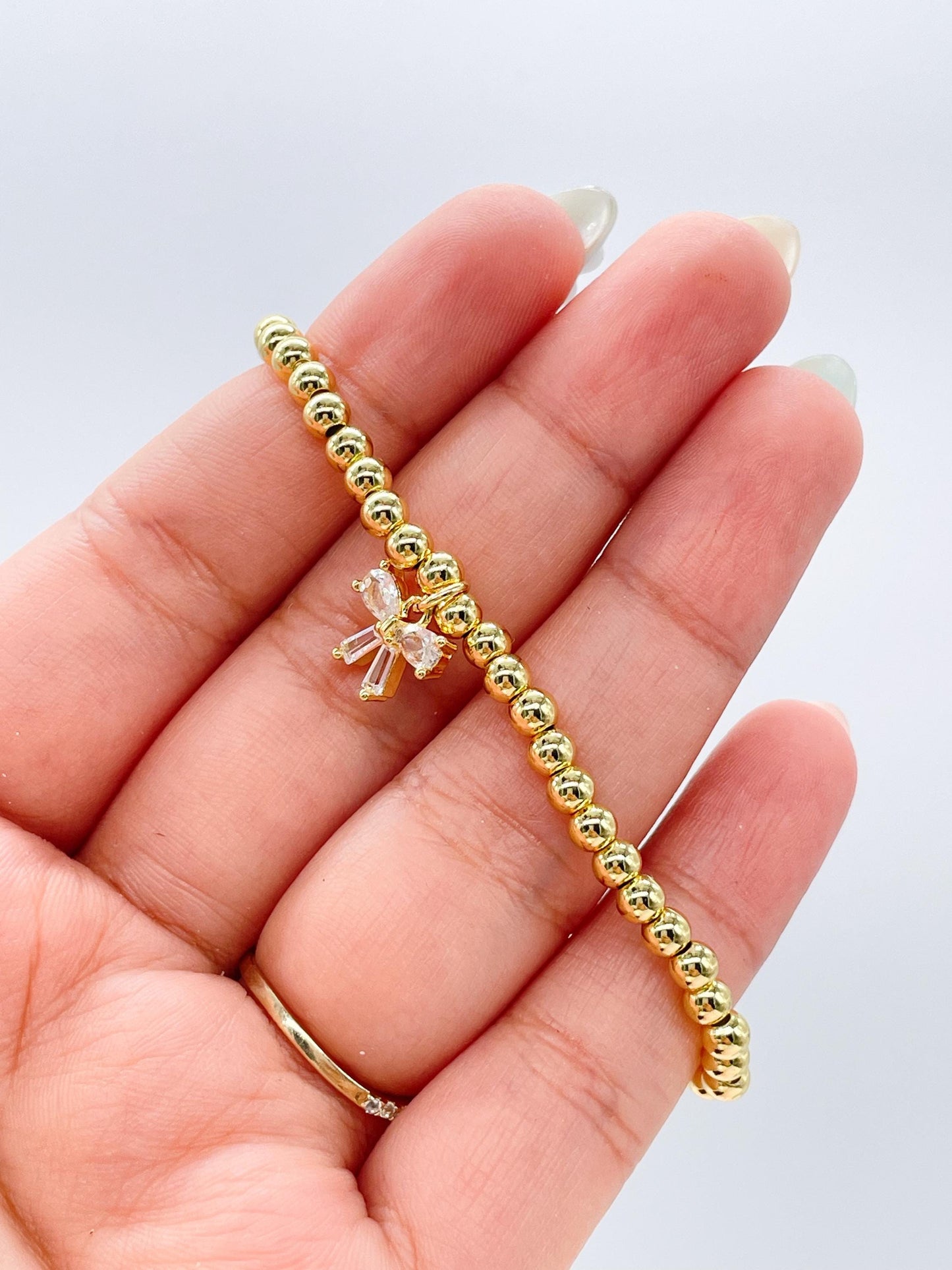 18k Gold Filled Elastic Classic 4mm Beaded Bracelet with CZ Dainty Bow
