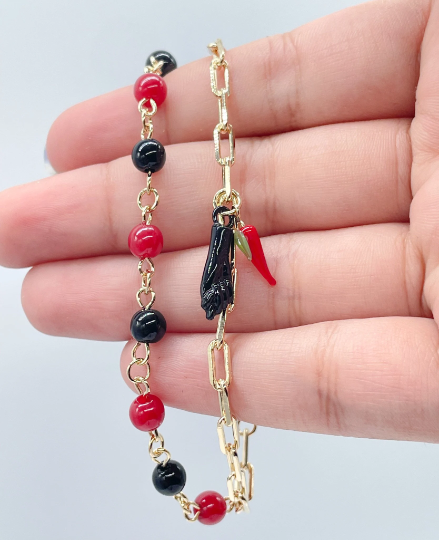 18k Gold Layered Bracelet with black and red beads and Pepper & Figa Charms