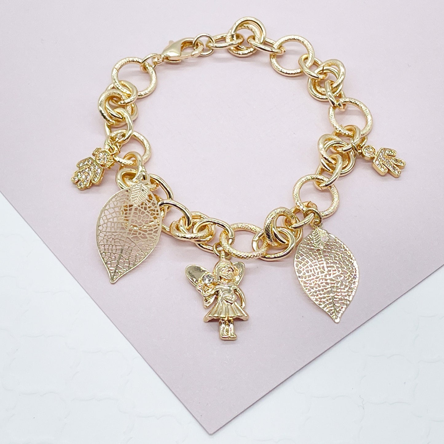 18k Gold Layered Large Link Bracelet Featuring Hanging Boy and Girl In Zirconia