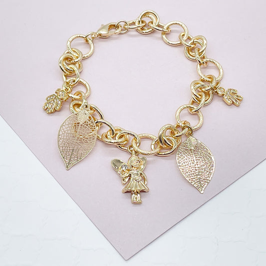 18k Gold Layered Large Link Bracelet Featuring Hanging Boy and Girl In Zirconia