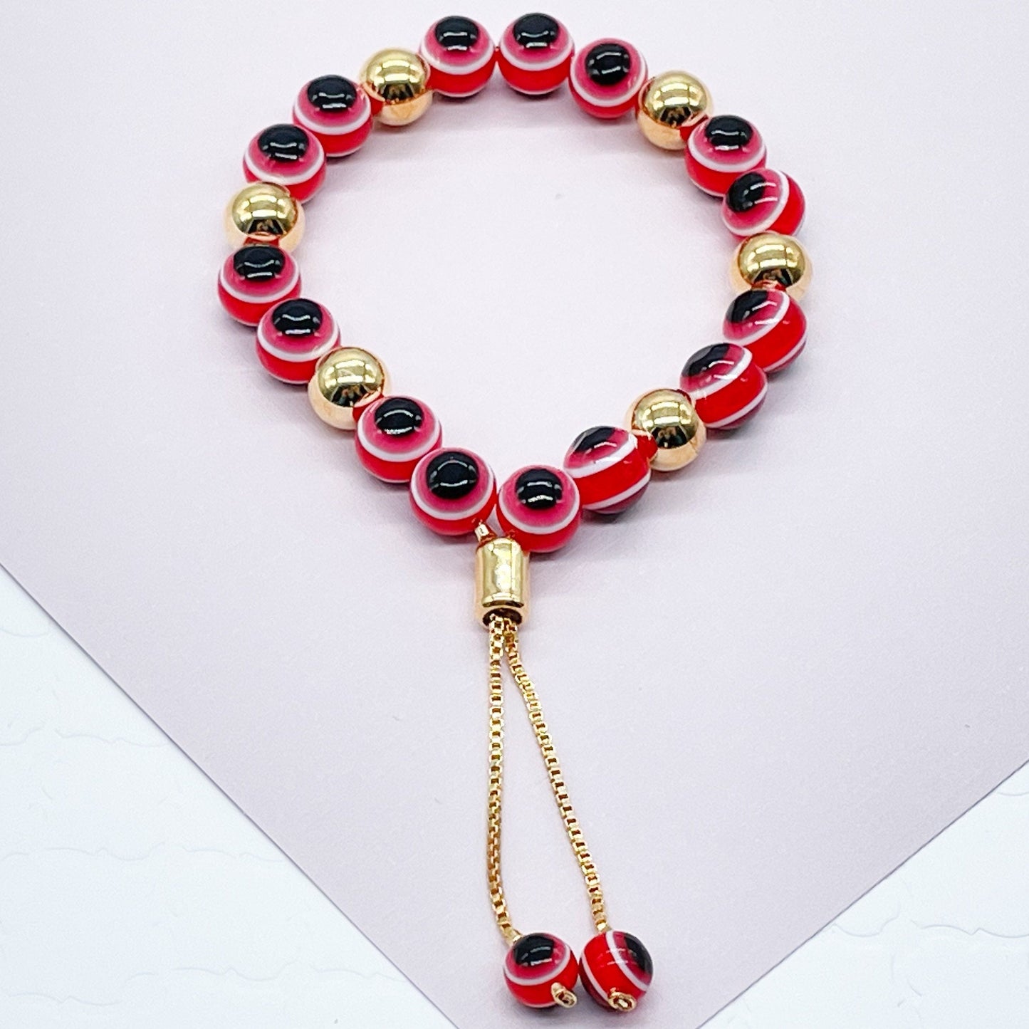 18k Gold Layered Glass Bead Ball Evil Eye Bracelet Featuring Gold Ball Bead on