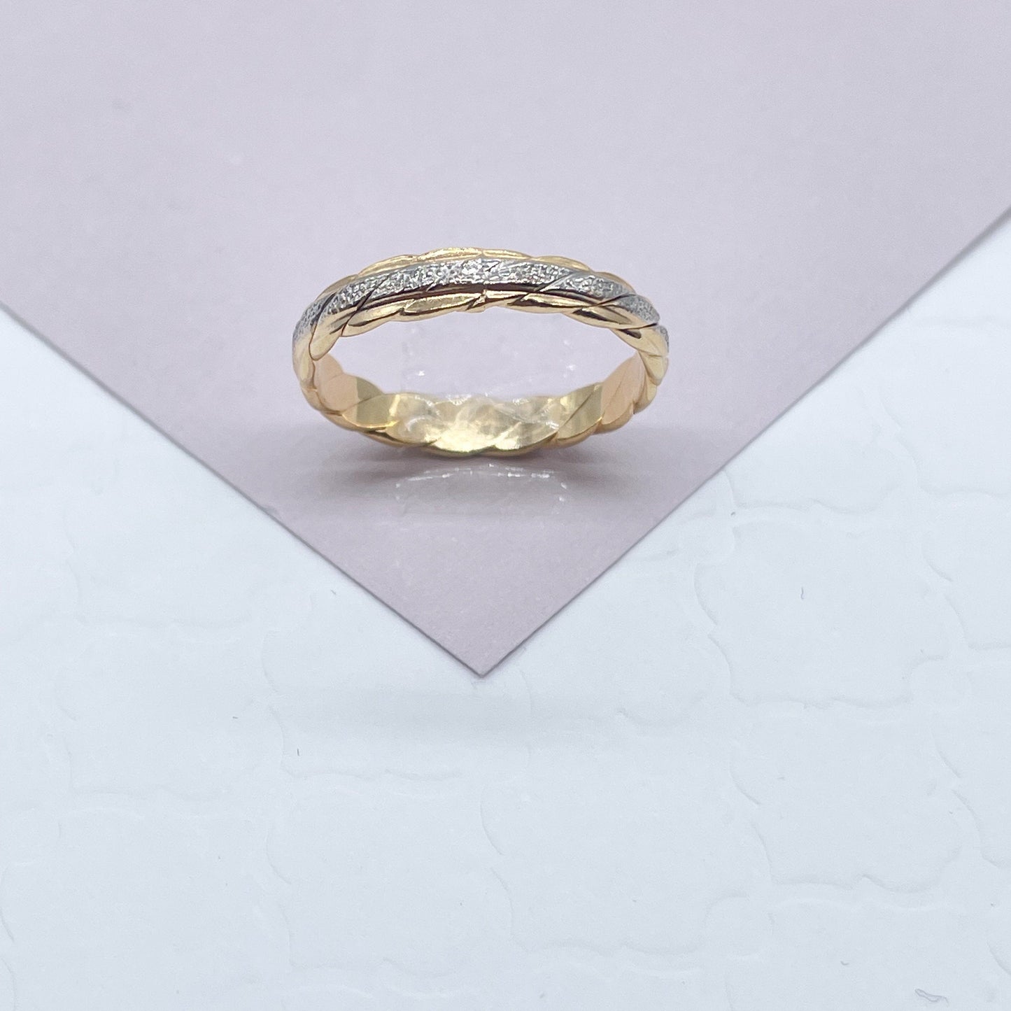 18k Gold Layered Twisted Details Ring Featuring A Line of Silver On Top Of The