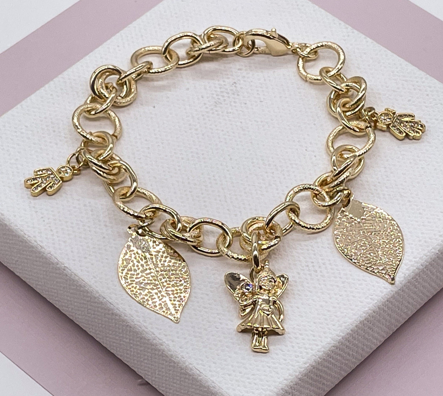 18k Gold Layered Large Link Bracelet Featuring Hanging Boy and Girl In Zirconia
