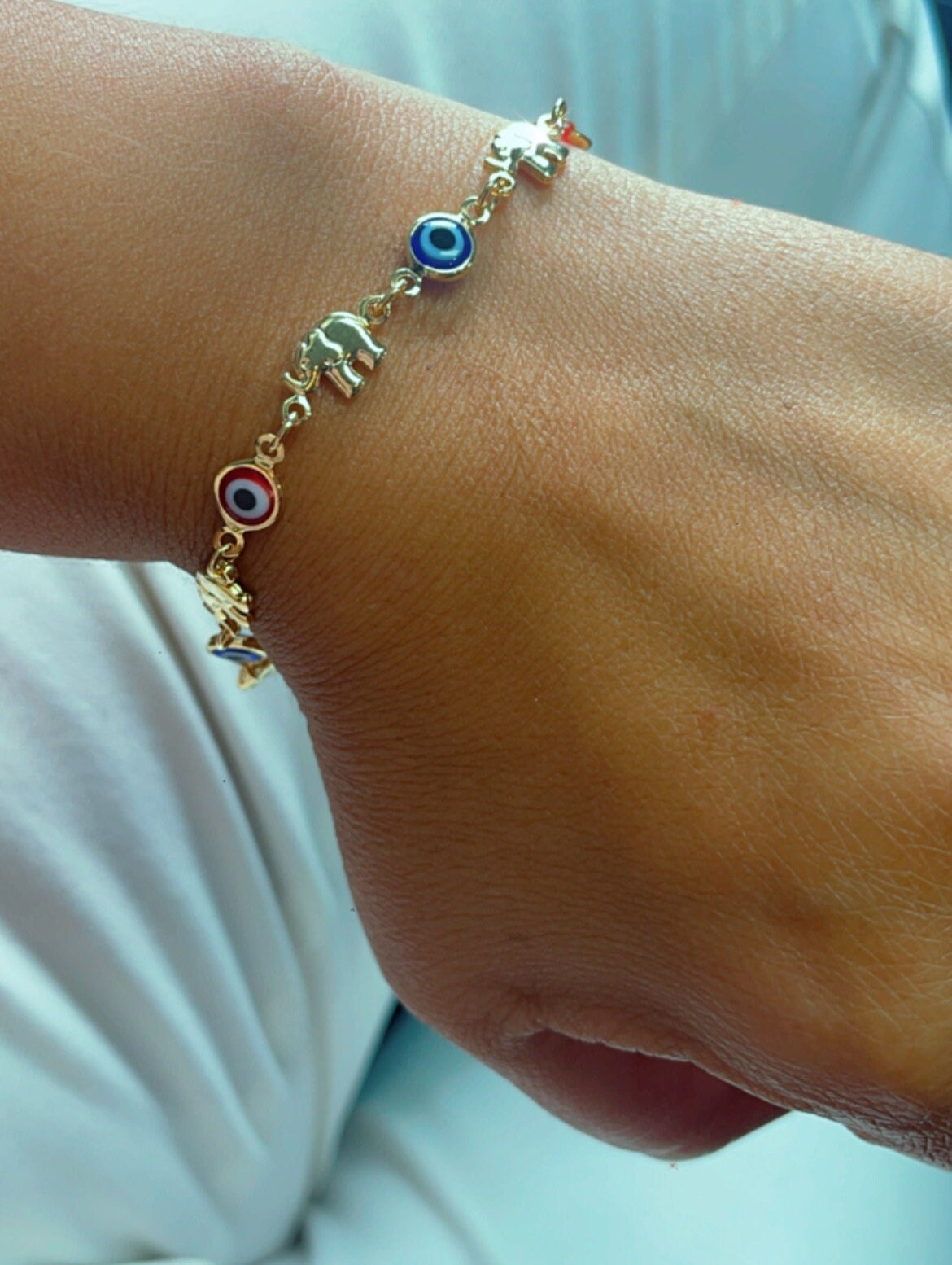 18k Gold Layered Elephant and Evil Eye Bracelet Featuring Red And Blue Evil