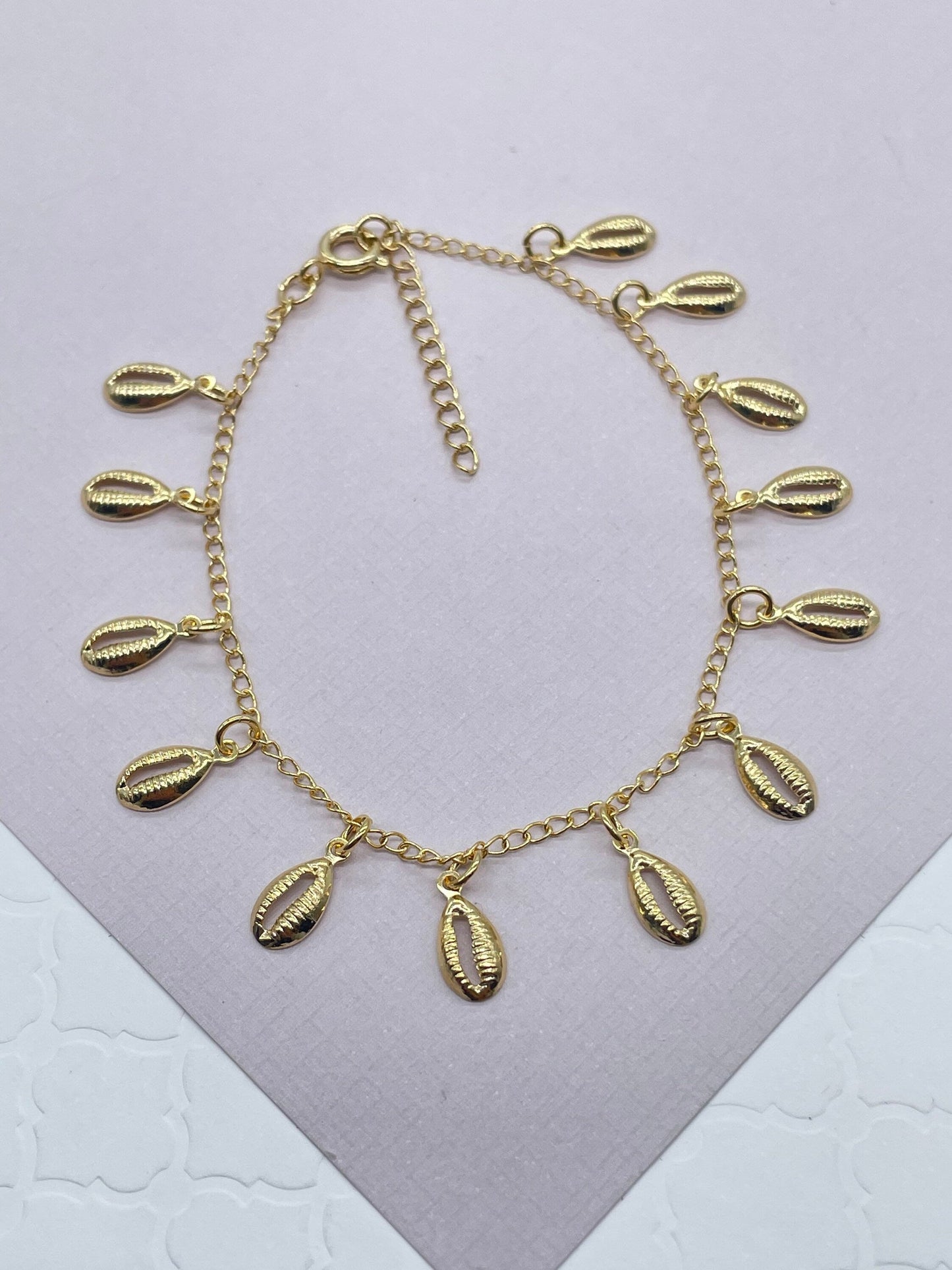 18k Gold Layered Dainty Chain with Eleven Extra Light Cowrie Shell Charms,