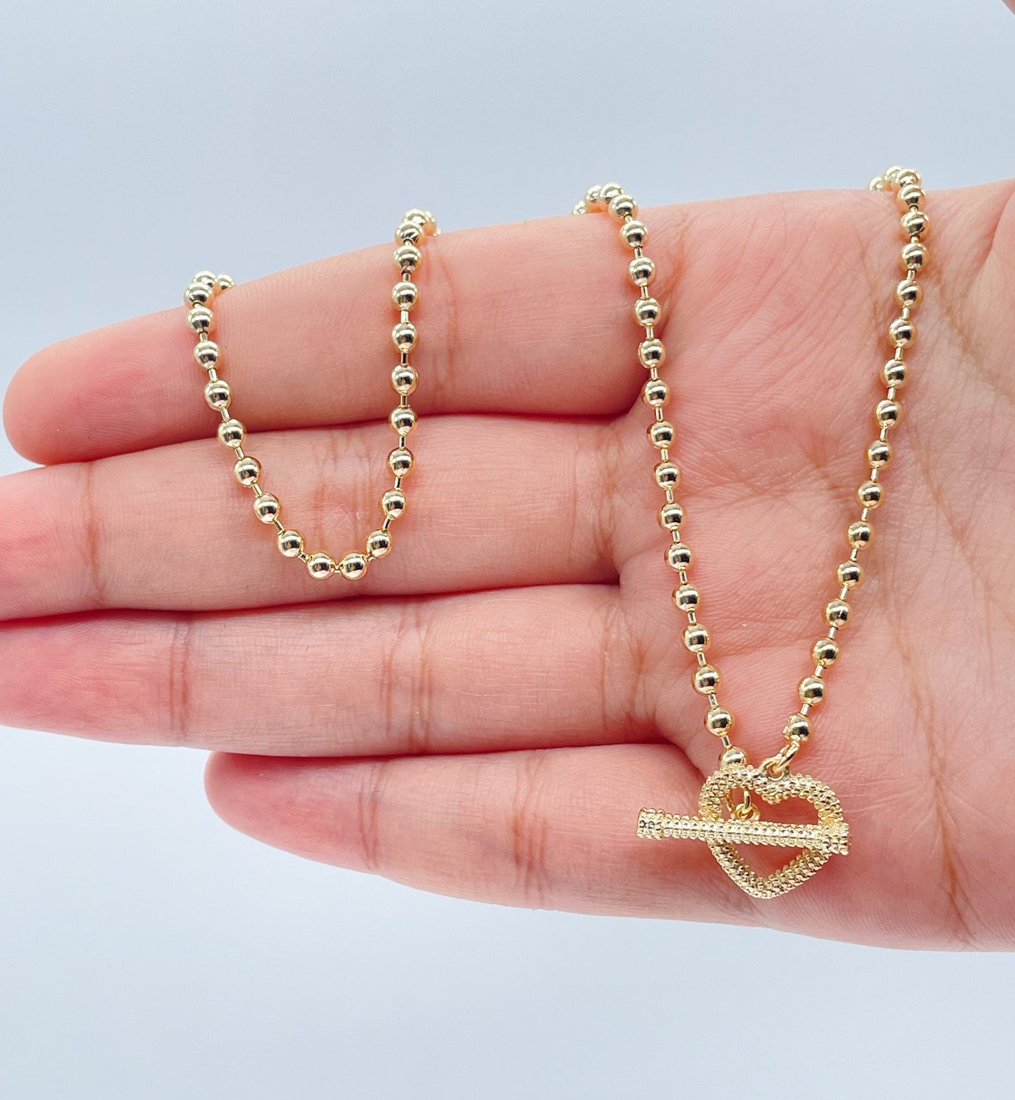 18k Gold Layered 3mm Beaded Necklace Featuring Toggle Heart Clasp