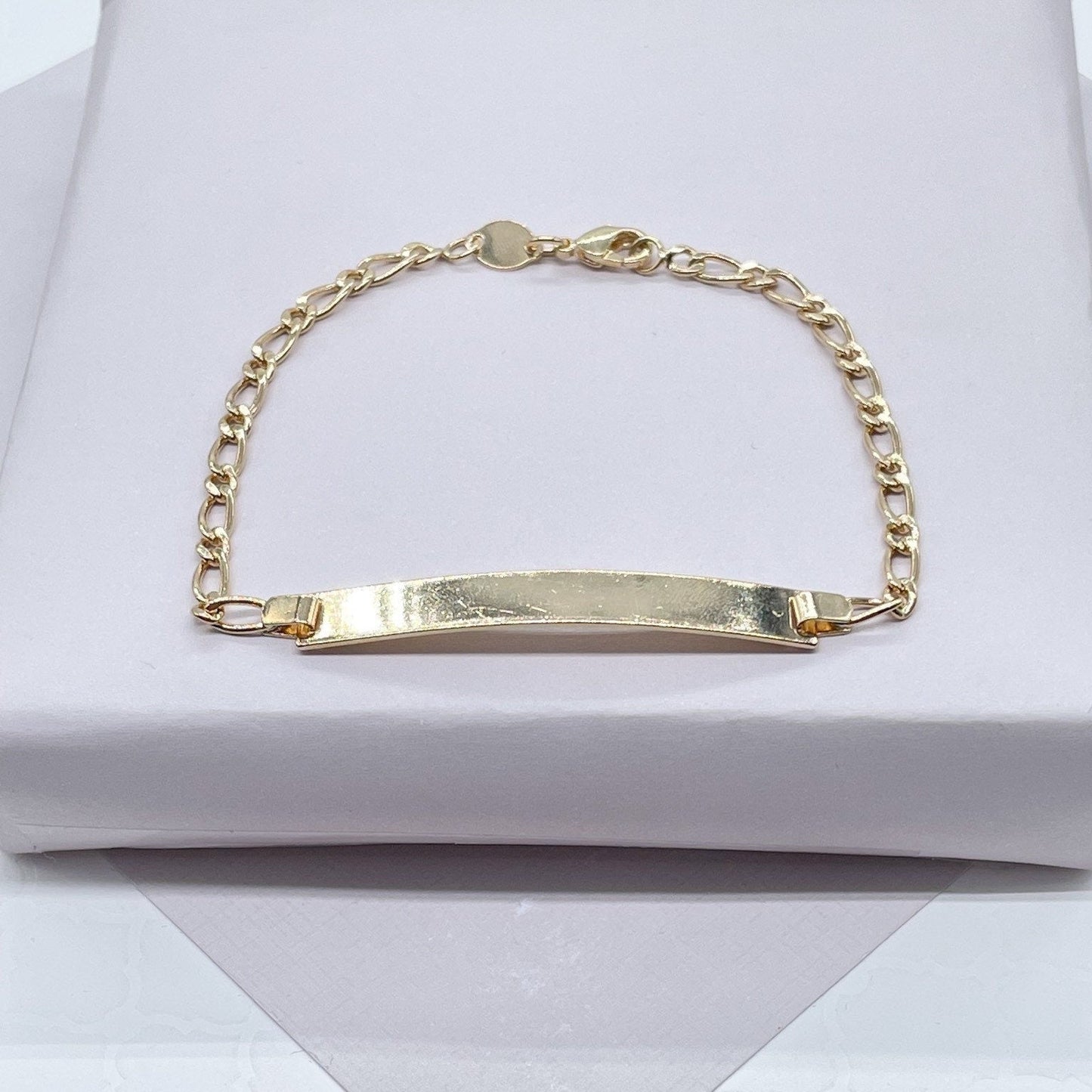 18k Gold Layered Plain ID Bracelet In A Figaro 1x1 Gold Layered Chain Wholesale