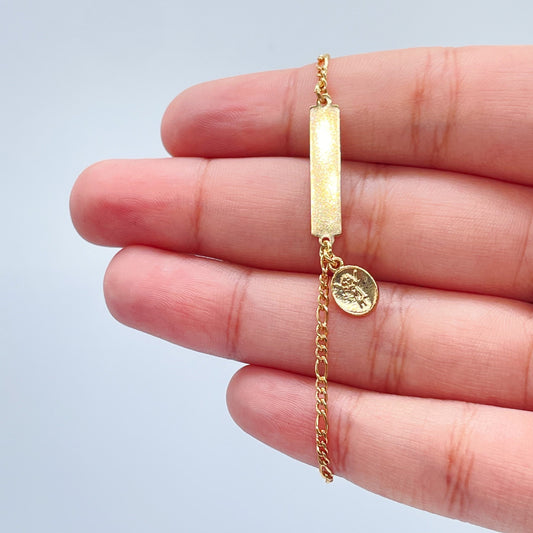 18k Gold Layered Figaro Chain ID Bar Bracelet Featuring Detail Virgin Mary