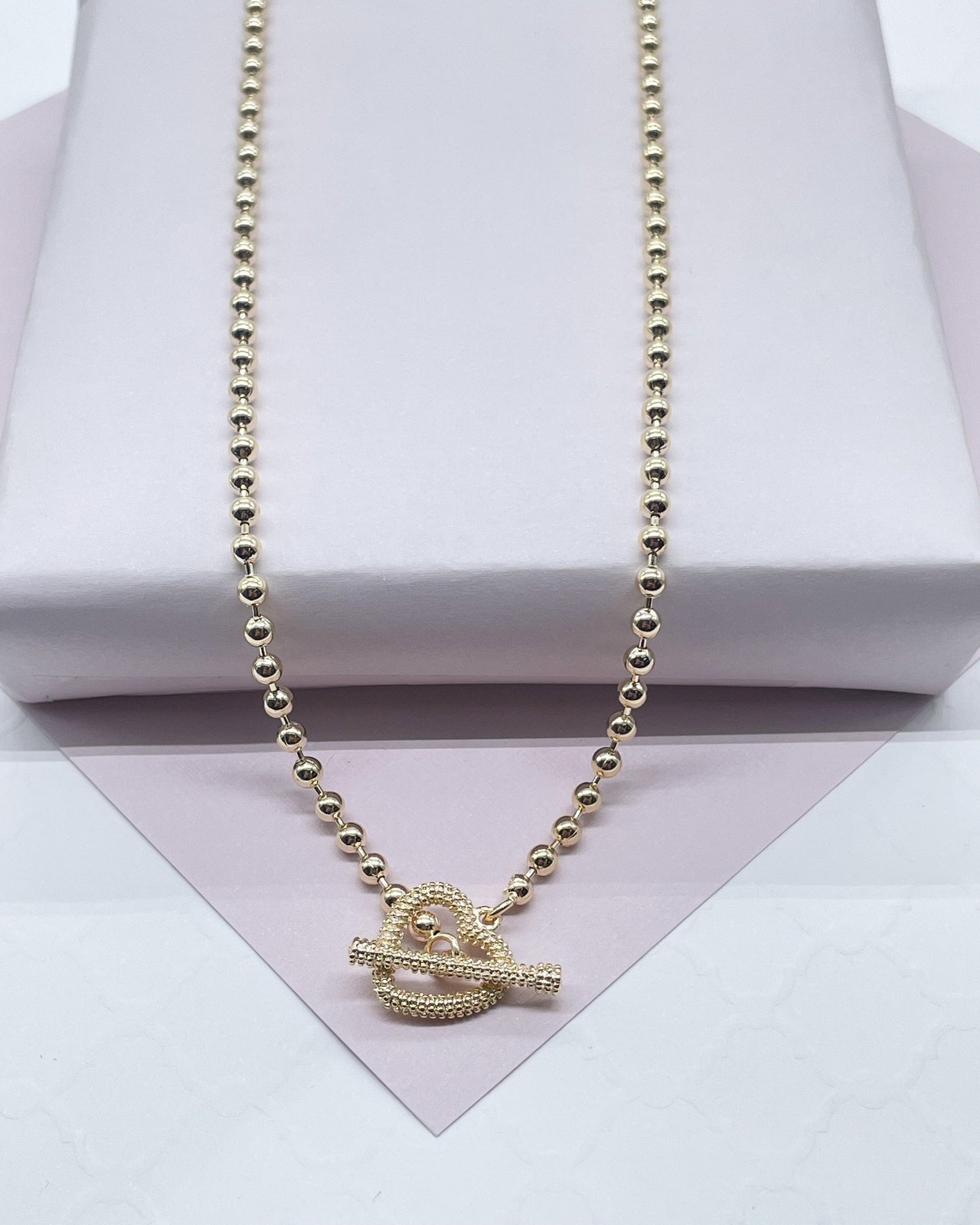 18k Gold Layered 3mm Beaded Necklace Featuring Toggle Heart Clasp