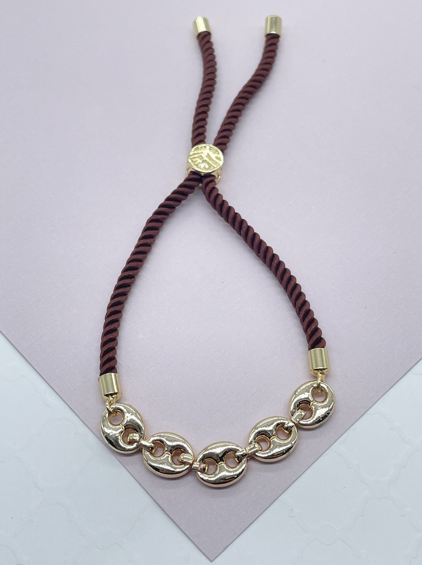18k Gold Layered Twisted Fabric Bracelet With Mariner Chain in The Center in