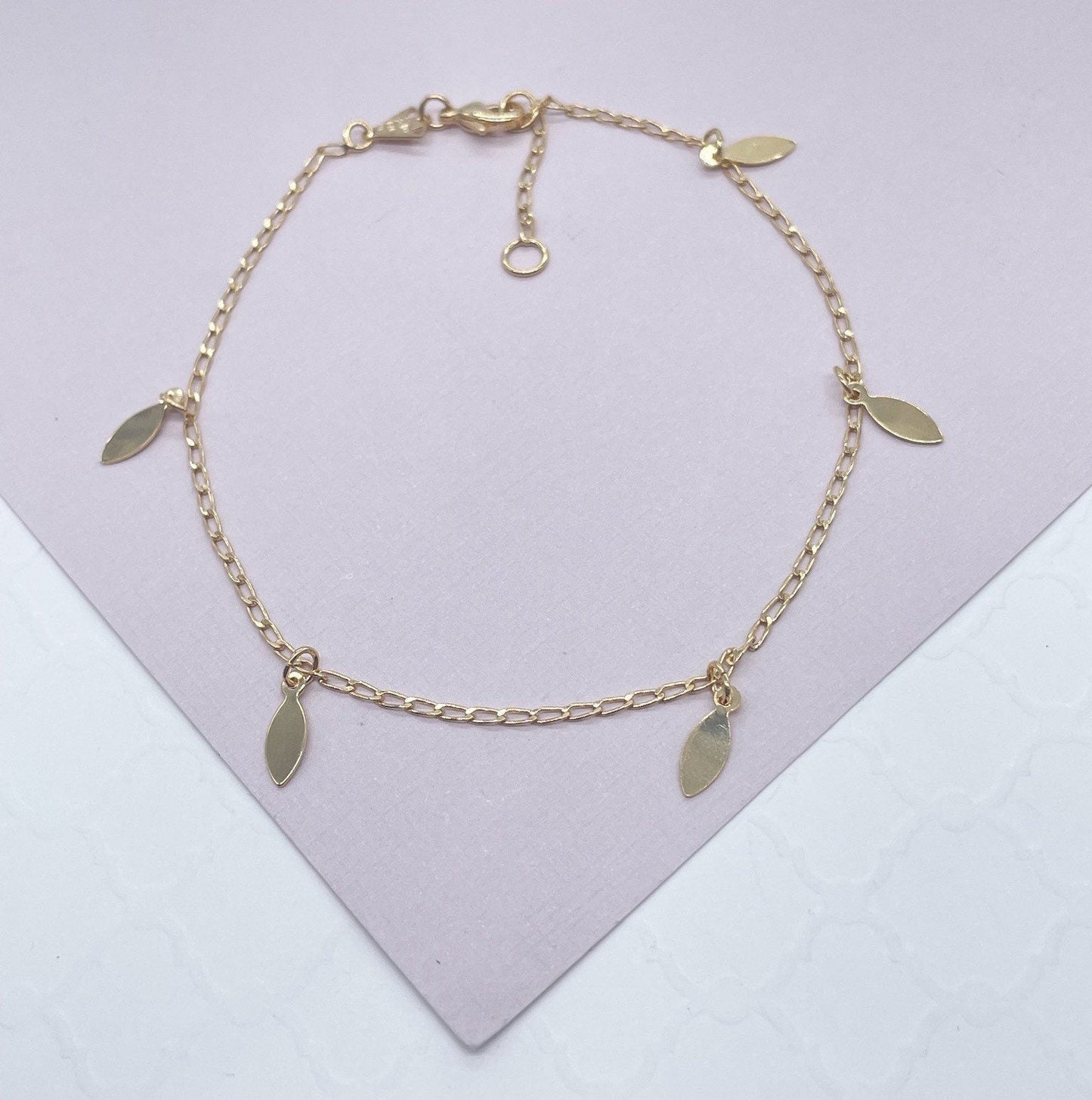 CO - 18k Gold Layered Charm Anklet Featuring Options In Heart or Leaves Wholesale